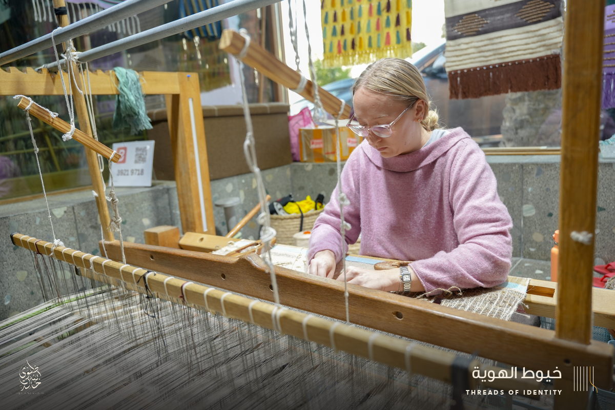 Mhairi Boyle at the looms of Bani Jamra