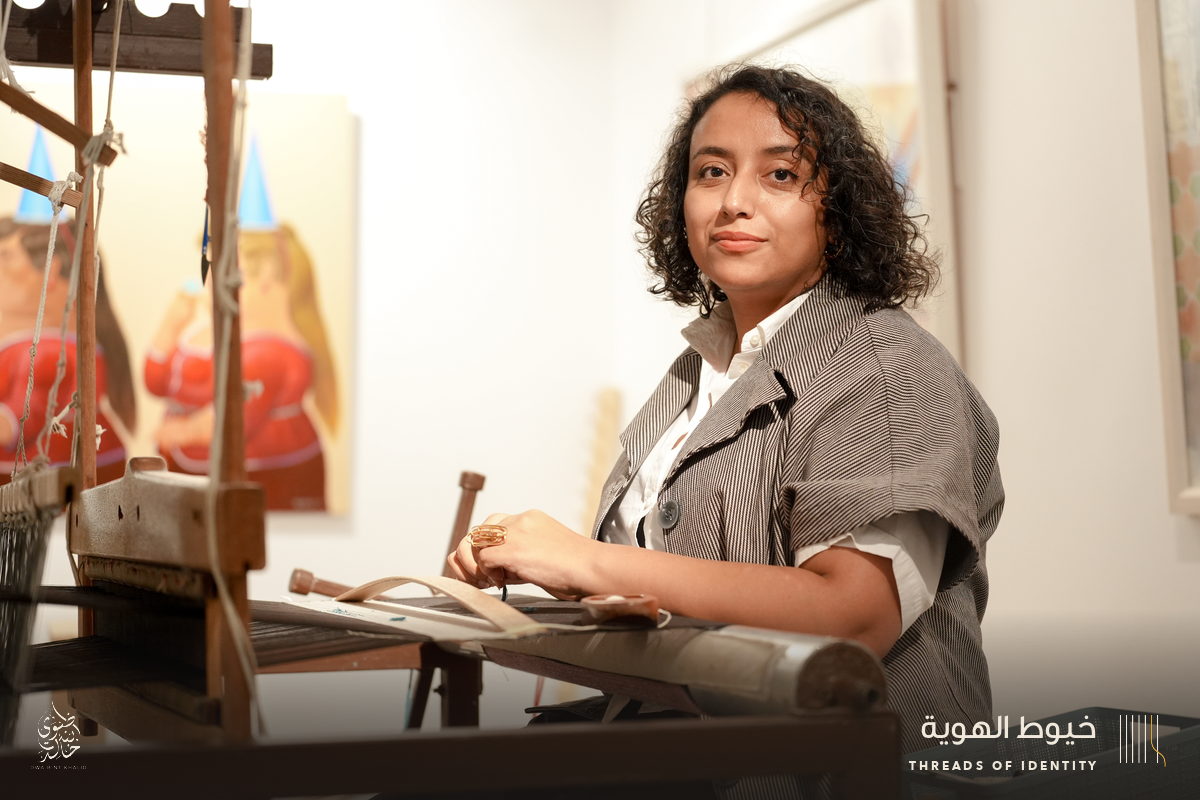 Marie Joubert and Tamadher AlFahal at the loom