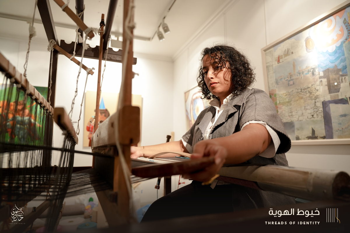 Marie Joubert and Tamadher AlFahal at the loom