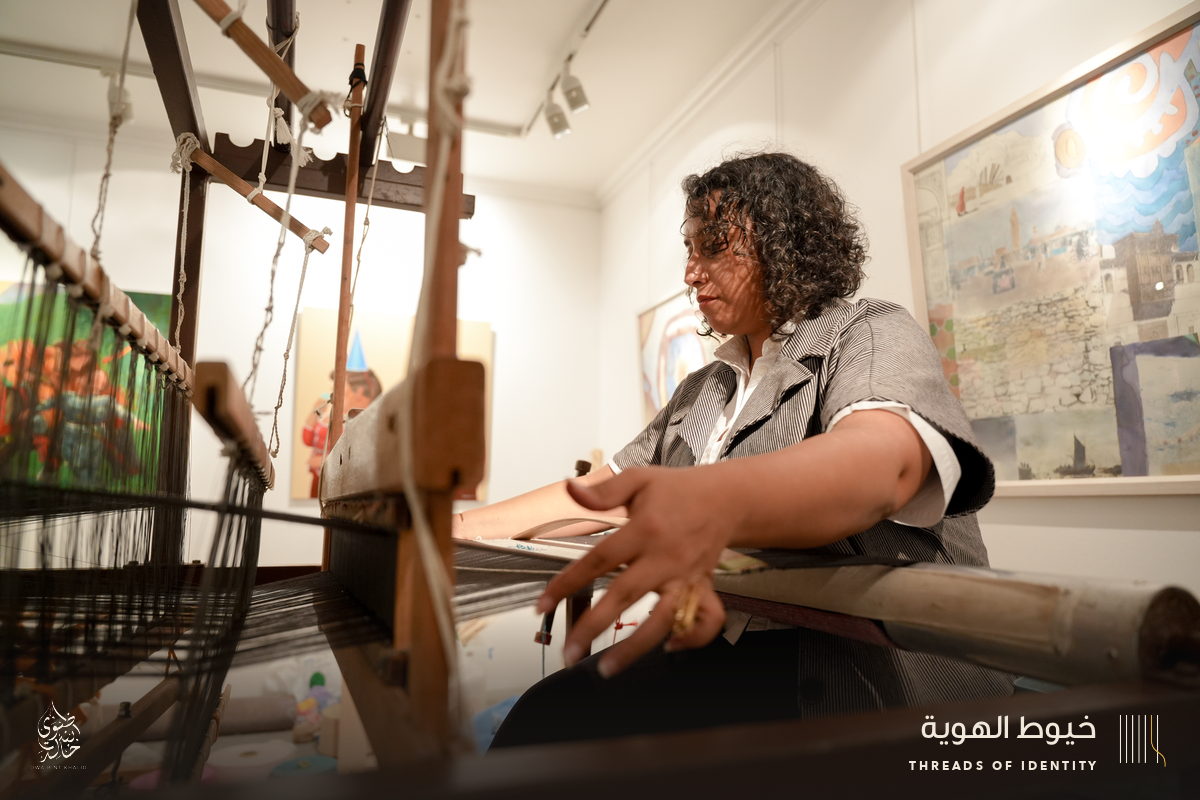 Marie Joubert and Tamadher AlFahal at the loom