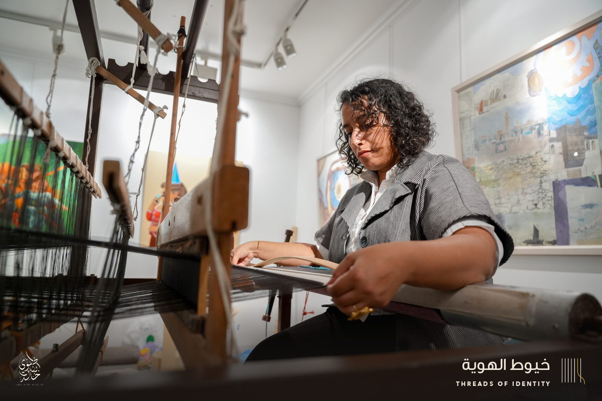 Marie Joubert and Tamadher AlFahal at the loom