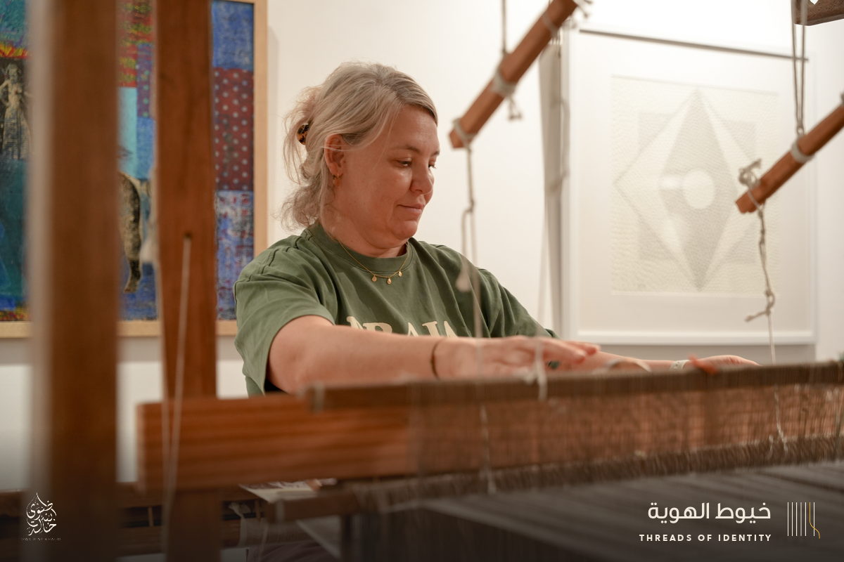 Marie Joubert and Tamadher AlFahal at the loom