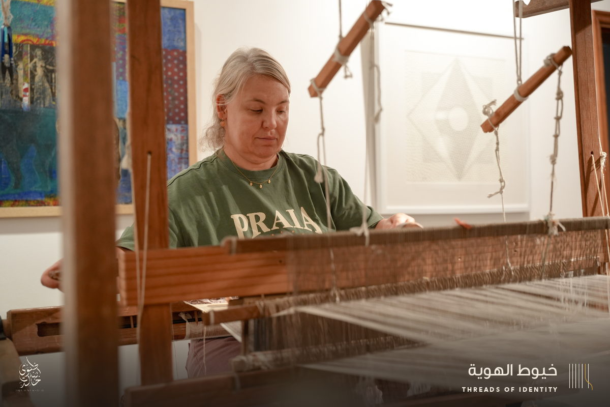 Marie Joubert and Tamadher AlFahal at the loom